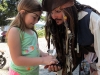 Jack Sparrow receiving a jewel from a jewel_edited-1.jpg